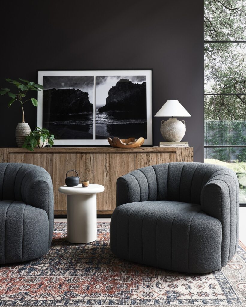 Staged living room with Zen vibes featuring a Boucle upholstered designer armchair